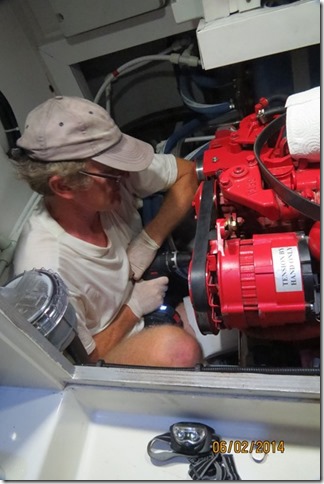 The Skipper at Work on the Port Engine