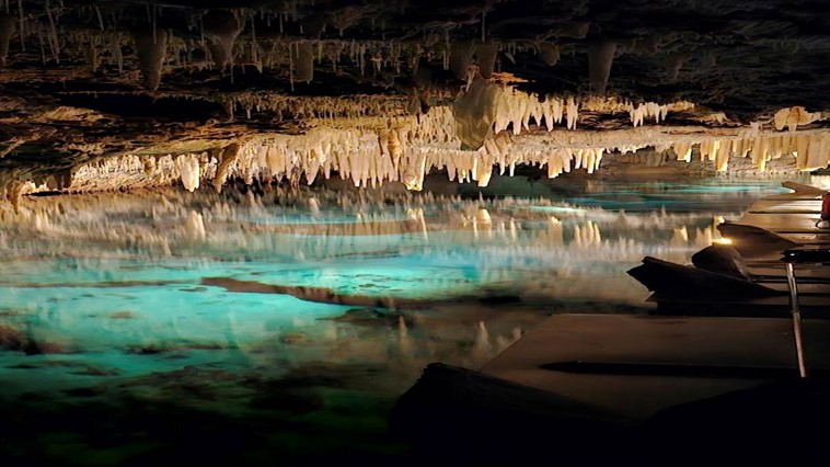 A picture containing nature, water, cave

Description automatically generated