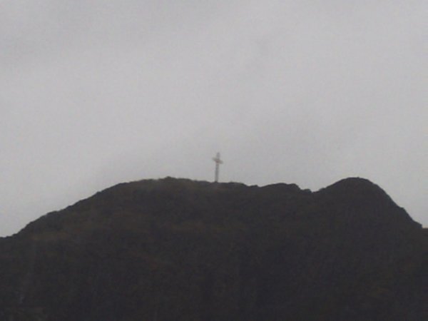 With the cross on top